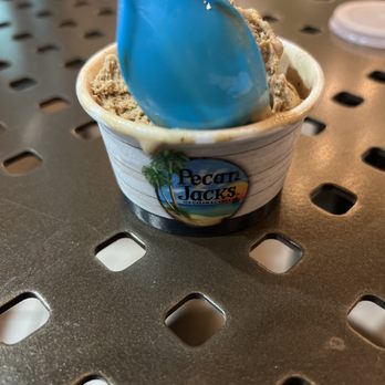 Pecan Jacks - an ice cream with a blue spoon sticking out of it - Ice Cream & Frozen Yogurt Near Me - Sea Grove Beach, Florida Pecan Jacks - an ice cream with a blue spoon sticking out of it - Ice Cream & Frozen Yogurt Near Me - Sea Grove Beach, Florida