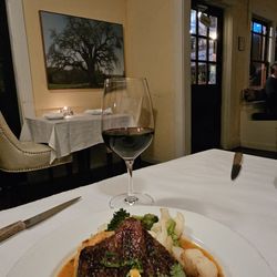 Black Cat Bistro - Ribeye steak with mashed potatoes n vegetables.