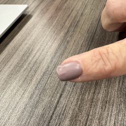 Serenity Nail Spa - My nail is bubbly. I can move the gel on my nail.