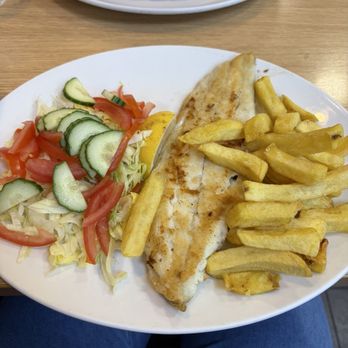 Laughing Halibut - Grilled halibut, chips, and salad - Fish & Chips Near Me - London, XGL Laughing Halibut - Grilled halibut, chips, and salad - Fish & Chips Near Me - London, XGL