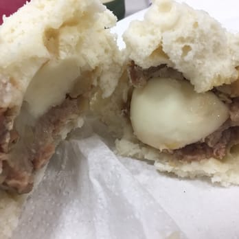 Mei Sum - Big bao. It has half of an egg inside. This might look big but about 1/3 of this is dough. For $1.50 it's what's expected - Bakeries Near Me - Boston, Massachusetts