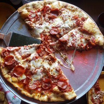 Magustos - The delish Meatza. - Pizza Near Me - Minturn, Colorado Magustos - The delish Meatza. - Pizza Near Me - Minturn, Colorado
