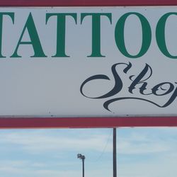 Lucky's 13 Tattoo Shop - Road sign