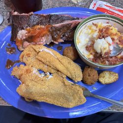 Wagg's Bar-B Q - Catfish and ribs plate with loaded mashed potatoes(?) and hush puppies