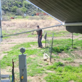 Bain's RV Park - Owner spraying Roundup all the way around his wife's garden. Clueless! - RV Parks Near Me - Oroville, Washington Bain's RV Park - Owner spraying Roundup all the way around his wife's garden. Clueless! - RV Parks Near Me - Oroville, Washington
