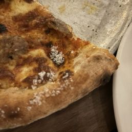 The amount of salt on the pizza.