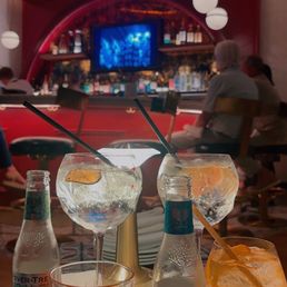 Gin & Tonics, Negroni, Aperol Spritz Gin & Tonics, Negroni, Aperol Spritz