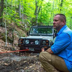 Ridgeback Guide Service - Guiding a Land Rover 110 through an obstacle.