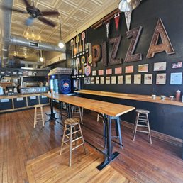 The inside of the pizza place.