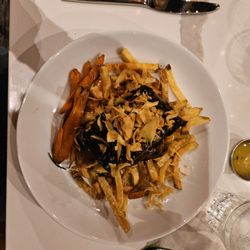 Tuscan Brick Oven Bistro - Short rib over truffle fries.