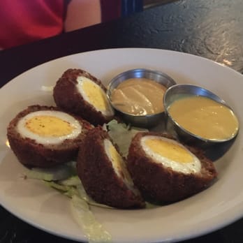 The Canyon's Crown - Irish scotch eggs. Super good! Hard boiled egg wrapped in sausage and fried. - Pubs Near Me - Tucson, Arizona The Canyon's Crown - Irish scotch eggs. Super good! Hard boiled egg wrapped in sausage and fried. - Pubs Near Me - Tucson, Arizona