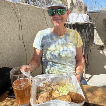 Stuffedlust - She's about to tear into the chile rellano egg rolls, so dang good!! - Food Trucks Near Me