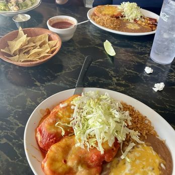 Karichimaka Restaurant - Chicken salad, chips, salsa, combo plate, chile relleno plate. Cheese hides the magnificent refried beans. - Mexican Near Me - Tucson, Arizona