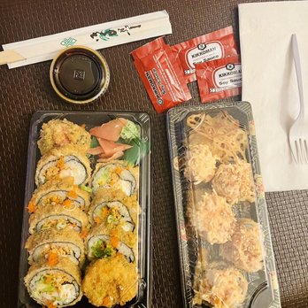 Steak Stone & Sushi Niagara Falls - Left are the Little Delicious Roll, right is the Las Vegas Super Star Roll. Container is eel sauce - Sushi Bars Near Me - Niagara Falls, New York