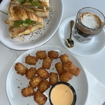 Homebrew Coffee Shop & Eatery - Spicy Chicken Croissant, tater tots, Con Panna - Coffee & Tea Near Me - Katy, Texas Homebrew Coffee Shop & Eatery - Spicy Chicken Croissant, tater tots, Con Panna - Coffee & Tea Near Me - Katy, Texas