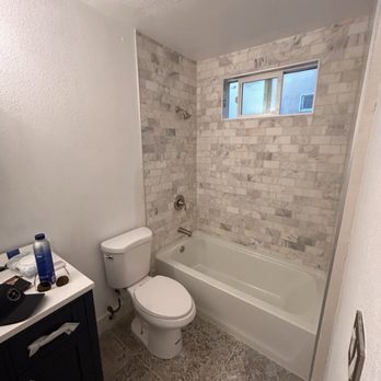Exodus Property Restoration - Love the beautiful tile work with the marble tiles i selected for the shower. - General Contractors Near Me - San Diego, California