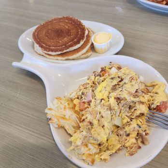 Jimmy's Egg - Caritas Queso skillet (without queso), mini-stack pancakes - Breakfast & Brunch Near Me - Oklahoma City, Oklahoma Jimmy's Egg - Caritas Queso skillet (without queso), mini-stack pancakes - Breakfast & Brunch Near Me - Oklahoma City, Oklahoma