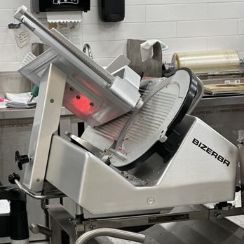 H-E-B - ows an industrial kitchen with a meat slicer - Grocery Near Me - Austin, Texas H-E-B - ows an industrial kitchen with a meat slicer - Grocery Near Me - Austin, Texas