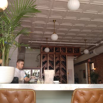 Kindred Restaurant - Beautiful touch, leaving the ceiling original. - New American Near Me - Davidson, North Carolina