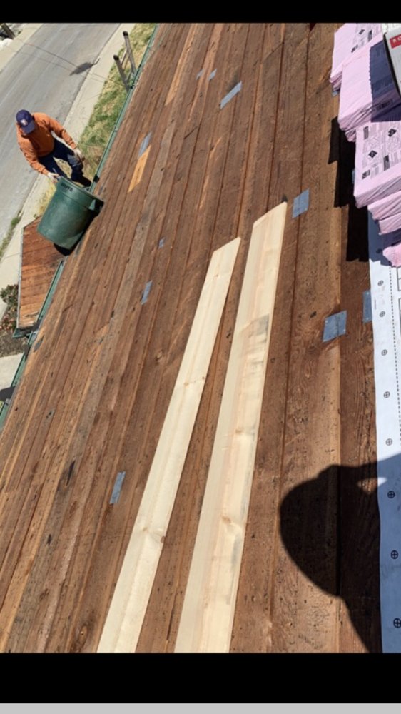 Slide of Michiel Roofing