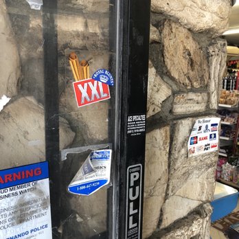 Cork'n Jug - a vending machine with stickers on it - Beer, Wine & Spirits Near Me - San Fernando, California Cork'n Jug - a vending machine with stickers on it - Beer, Wine & Spirits Near Me - San Fernando, California