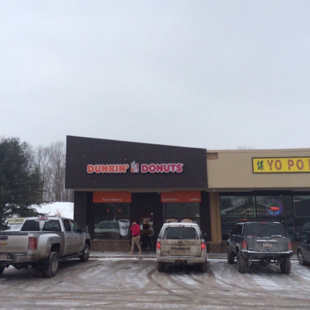  the outside of a dunkin donut shop