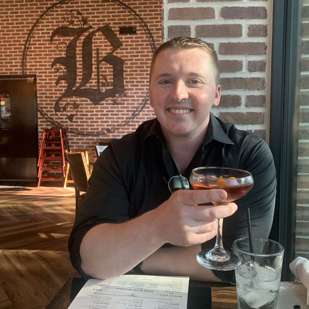 Bosscat Kitchen & Libations  - My husband with his beverage - New American Near Me - Woodlands, Texas