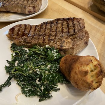 Sur La Table - NY strip, tiny popover + kale. No steak topping like they said there would be on class website. Class not worth it, In my opinion. - Kitchen Supplies Near Me - Newport Beach, California