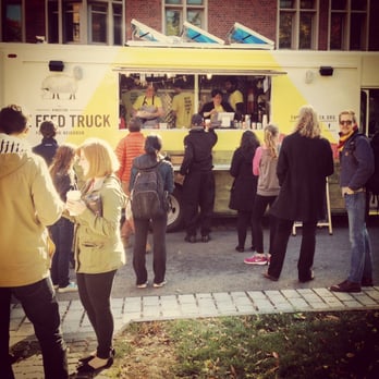 The Feed Truck - a group of people standing in front of a food truck - Food Trucks Near Me The Feed Truck - a group of people standing in front of a food truck - Food Trucks Near Me