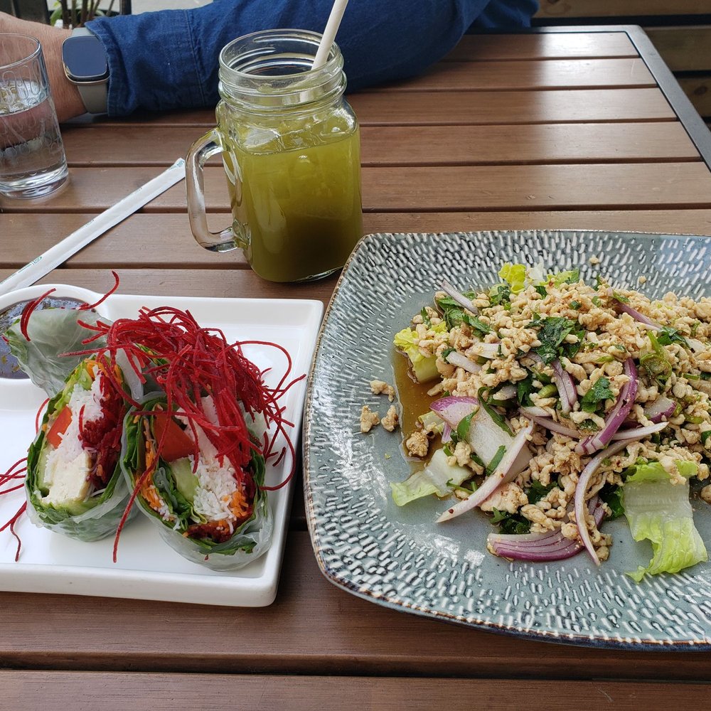 Thai Pad - Vegetable Spring Rolls on the left, Chicken Larb Salad on the right Lemongrass Green Ice Tea - Thai Near Me - Washington, DC, District of Columbia Thai Pad - Vegetable Spring Rolls on the left, Chicken Larb Salad on the right Lemongrass Green Ice Tea - Thai Near Me - Washington, DC, District of Columbia