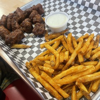 Mojo’s - Jerk Chicken wings. - Sports Bars Near Me - Dyersburg, Tennessee