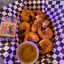 Rusty Hook Bar & Grill - Half pound, naw. Happy hour and they were wild and delicious. I'll be back for these.