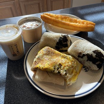 TX Rice Roll - From L to R: sweet soy milk cold, salty soy milk, fried bread, egg pancake, rice rolls - Taiwanese Near Me - Sugar Land, Texas TX Rice Roll - From L to R: sweet soy milk cold, salty soy milk, fried bread, egg pancake, rice rolls - Taiwanese Near Me - Sugar Land, Texas