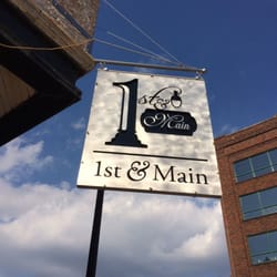 Digital Designs Signs Wraps & More - Hanging Signs for you store front, this one was made for 1st & Main.