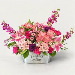 Eufloria Florist - La Vie en Rose - pink Stargazer lilies, spray roses, peach alstroemeria, purple carnations and seasonal blooms in a garden inspired planter