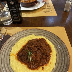 Trattoria Gabriello - Lasagna and wild boar with polenta. I think the lasagna was around €13, and the wild boar about €17. Delicious!