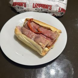 Monster sandwich with different meats on top and bottom. Monster sandwich with different meats on top and bottom.