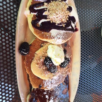 Snooze, an A.M. Eatery - Pancake flight. Blackberry sublime, blueberry danish and peanut butter cup - Breakfast & Brunch Near Me - Lone Tree, Colorado
