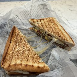 Turkey sausage bacon cheese egg on Texas toast Turkey sausage bacon cheese egg on Texas toast