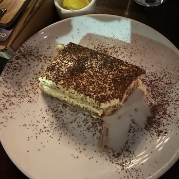 Mioposto - Tiramisu after the first few delicious bites. So good! - Italian Near Me - Seattle, Washington