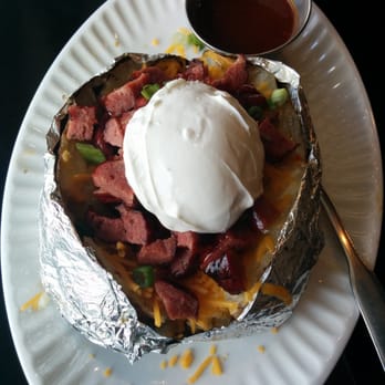 Gatlin's BBQ - Smoked Venison sausage stuffed potatoes. - Barbeque Near Me - Houston, Texas Gatlin's BBQ - Smoked Venison sausage stuffed potatoes. - Barbeque Near Me - Houston, Texas