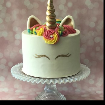 Simply Elegant Cakes - a cake with a unicorn's horn - Custom Cakes Near Me