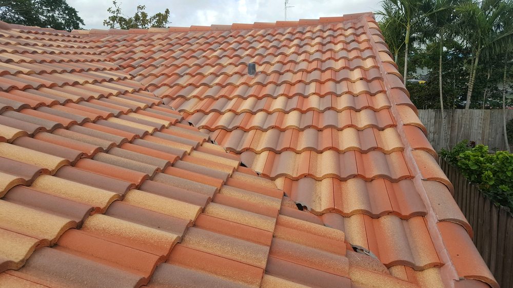 Slide of TNT Roofing