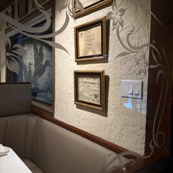 Le Sanglier French Restaurant - Another wall of awards