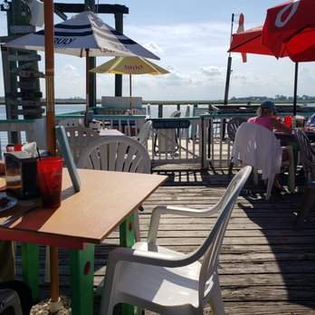 A-J's Dockside Restaurant - dining area on the dock, looking west - Seafood Near Me - Tybee Island, Georgia A-J's Dockside Restaurant - dining area on the dock, looking west - Seafood Near Me - Tybee Island, Georgia