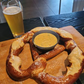 Escape Craft Brewery - Giant pretzel with beer cheese and a Sakura cherry blossom wheat ale - Breweries Near Me - Redlands, California