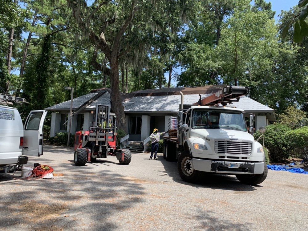Slide of Two Brothers Roofing