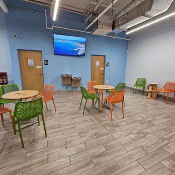 Clean Zone Laundry - A seating area and clean restrooms - Laundromat Near Me - West Palm Beach, Florida