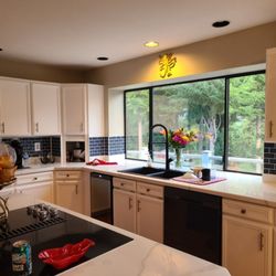 Alberto & Nicole Home Transformations - Beautiful refinished cabinets, new paint and trim fir dimensuon