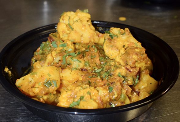 Bombay Curry & Pizzeria by null